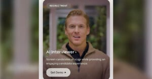 A man with short, light brown hair and a brown sweater speaks in a video. The text reads: "RECRUITMENT AI Interviewer Screen candidates at scale while providing an engaging candidate experience. Get Demo." The background is blurred greenery.