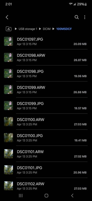 A screenshot of a smartphone file manager displaying a list of image files. Each file is labeled with a name like "DSC1097.JPG" with sizes ranging from 20.09 MB to 27.03 MB. The directory path is shown at the top. Battery level is at 29%.