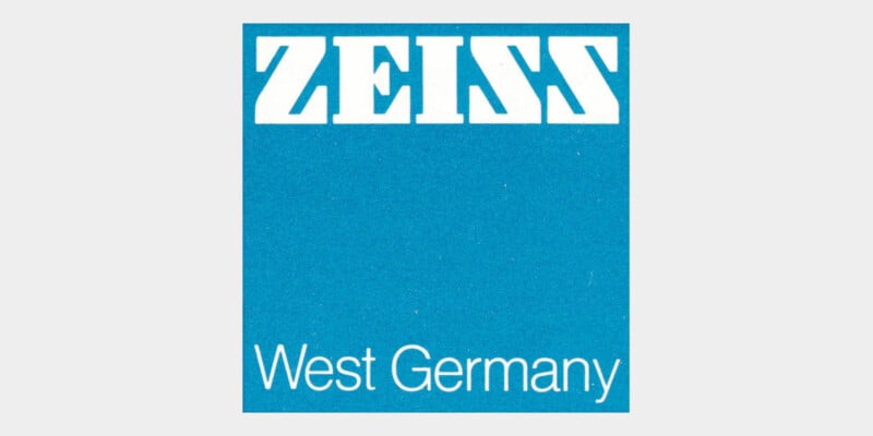 A blue square logo with "ZEISS" in large white letters at the top and "West Germany" in smaller white letters at the bottom.
